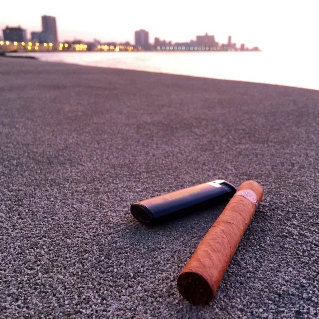 a cigar and lighter in cuba