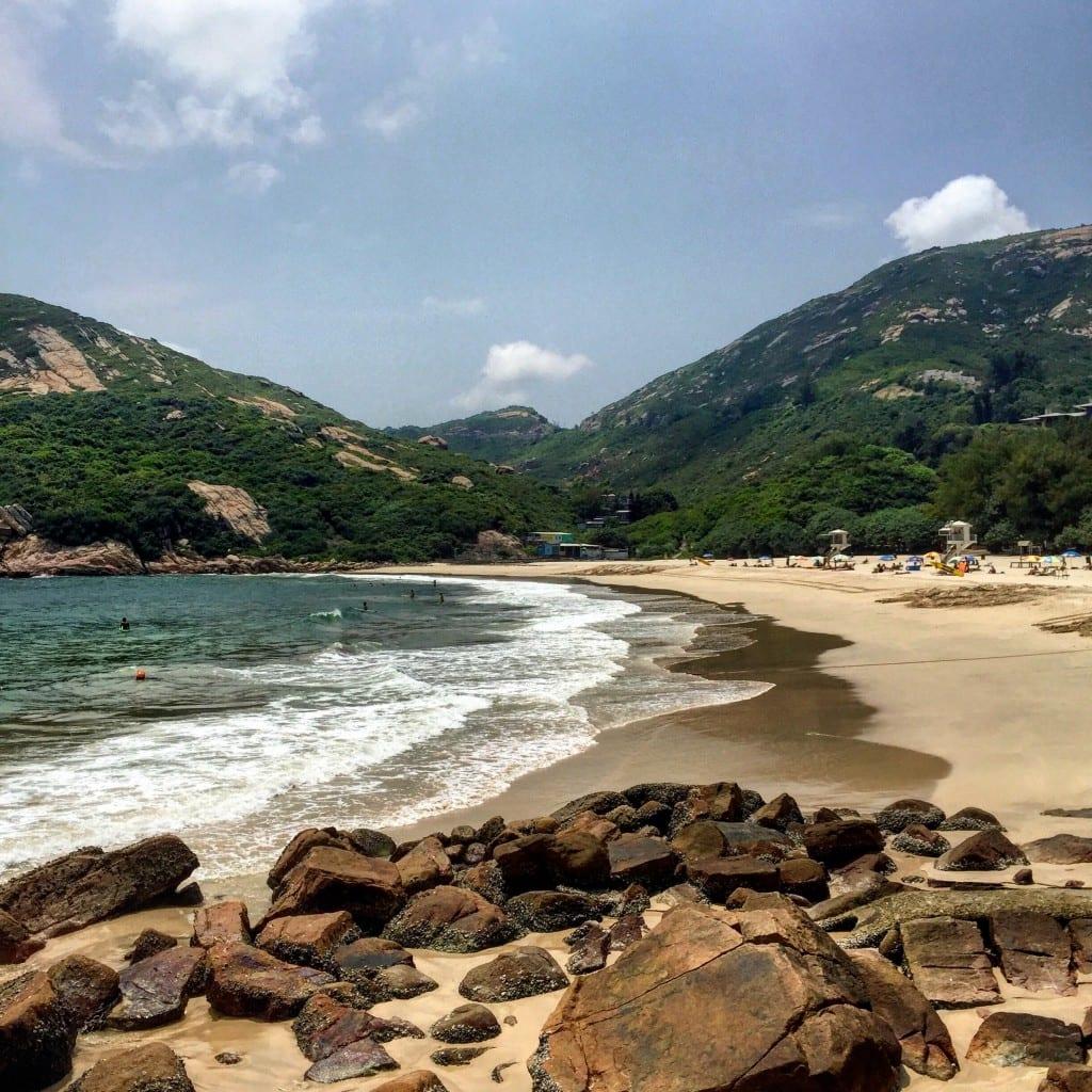 A rocky beach next to a body of water