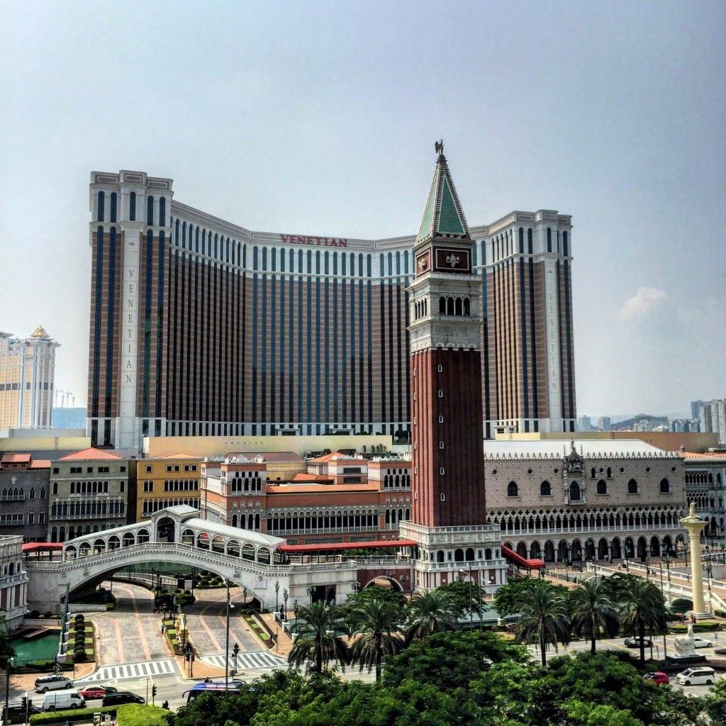 A large building towers over a city