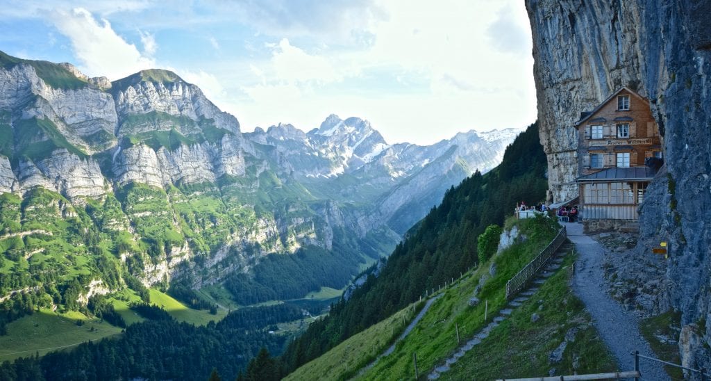 A canyon with a mountain in the background