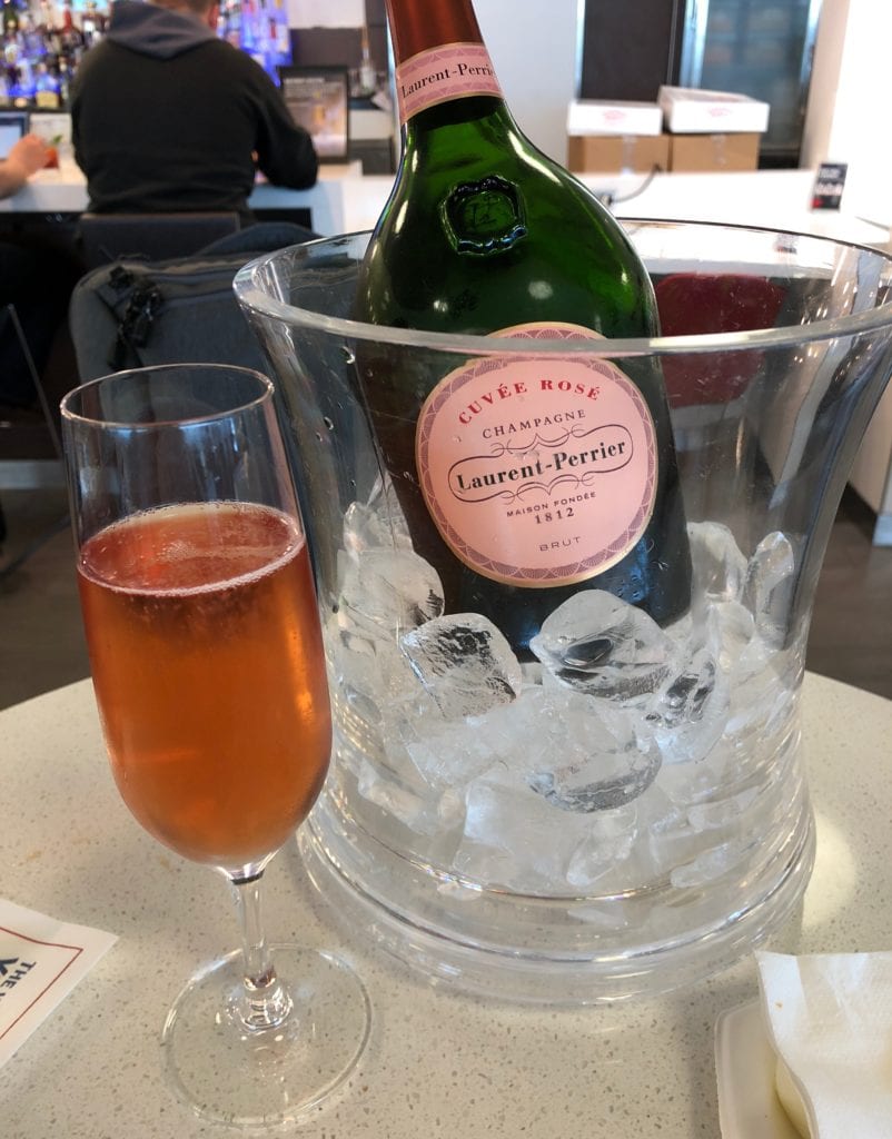 A bottle of champagne in the delta sky club