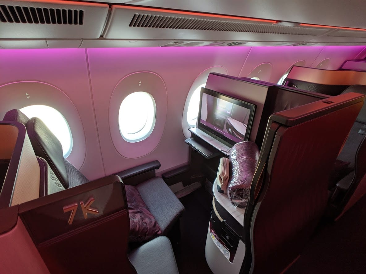 Interior of airplane with purple lighting