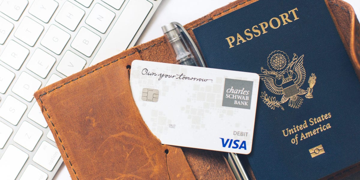 Charles Schwab debit card and a passport