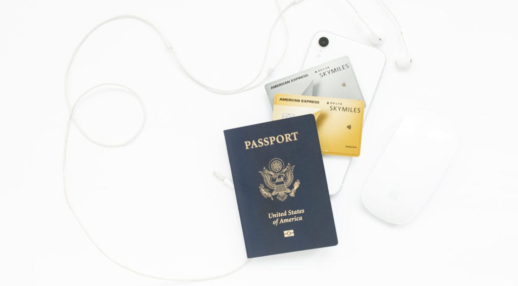 delta gold and platinum card with a passport