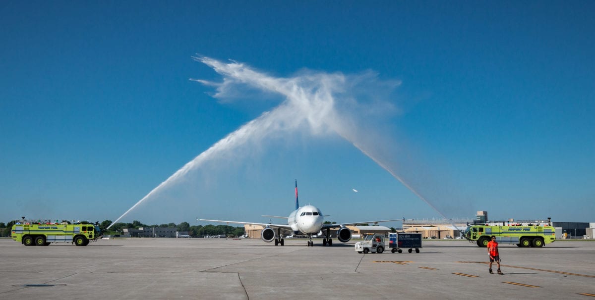 delta plane with a water cannon salute