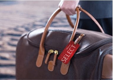 a man holding luggage