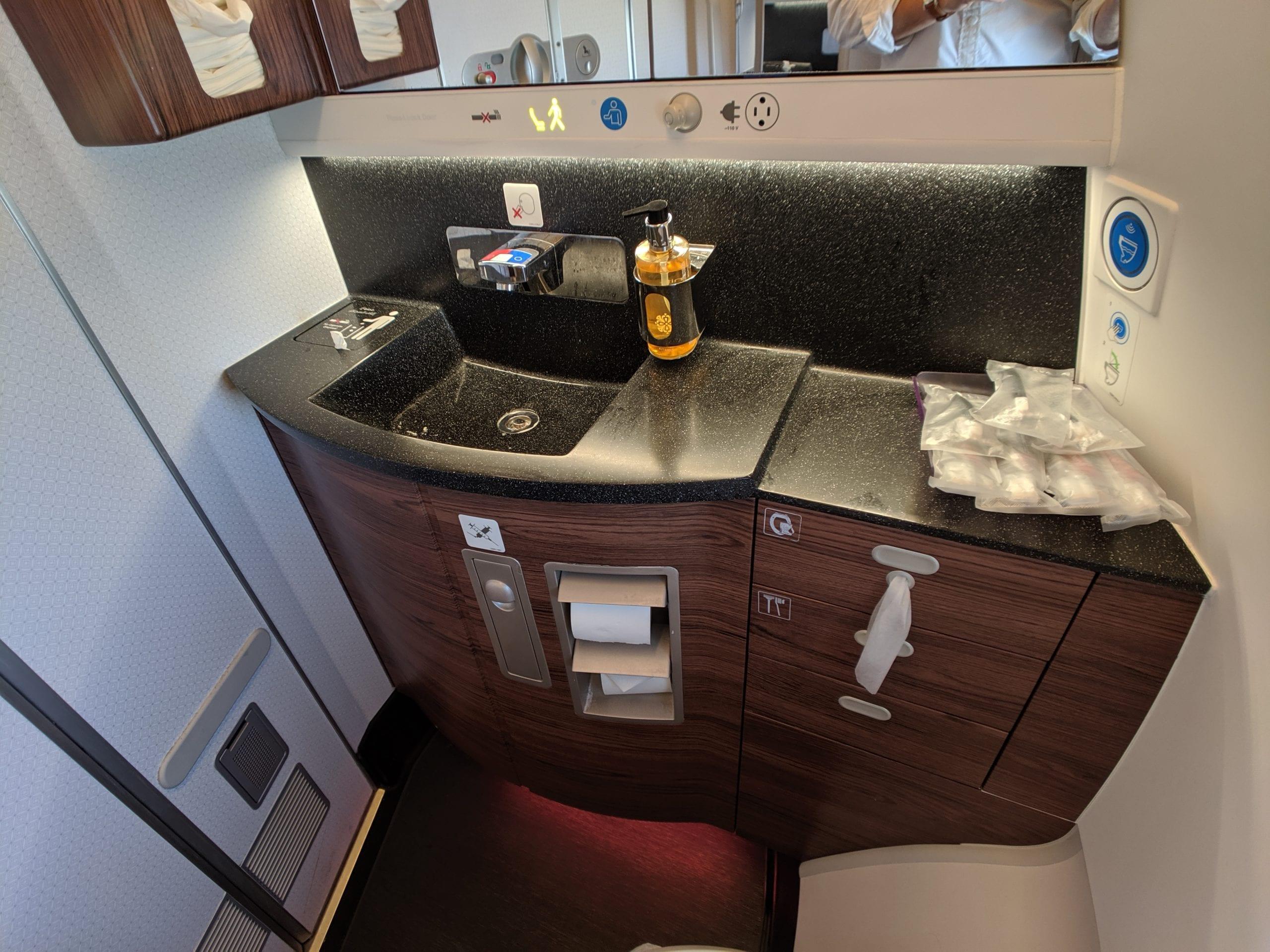 qatar airways qsuite bathroom