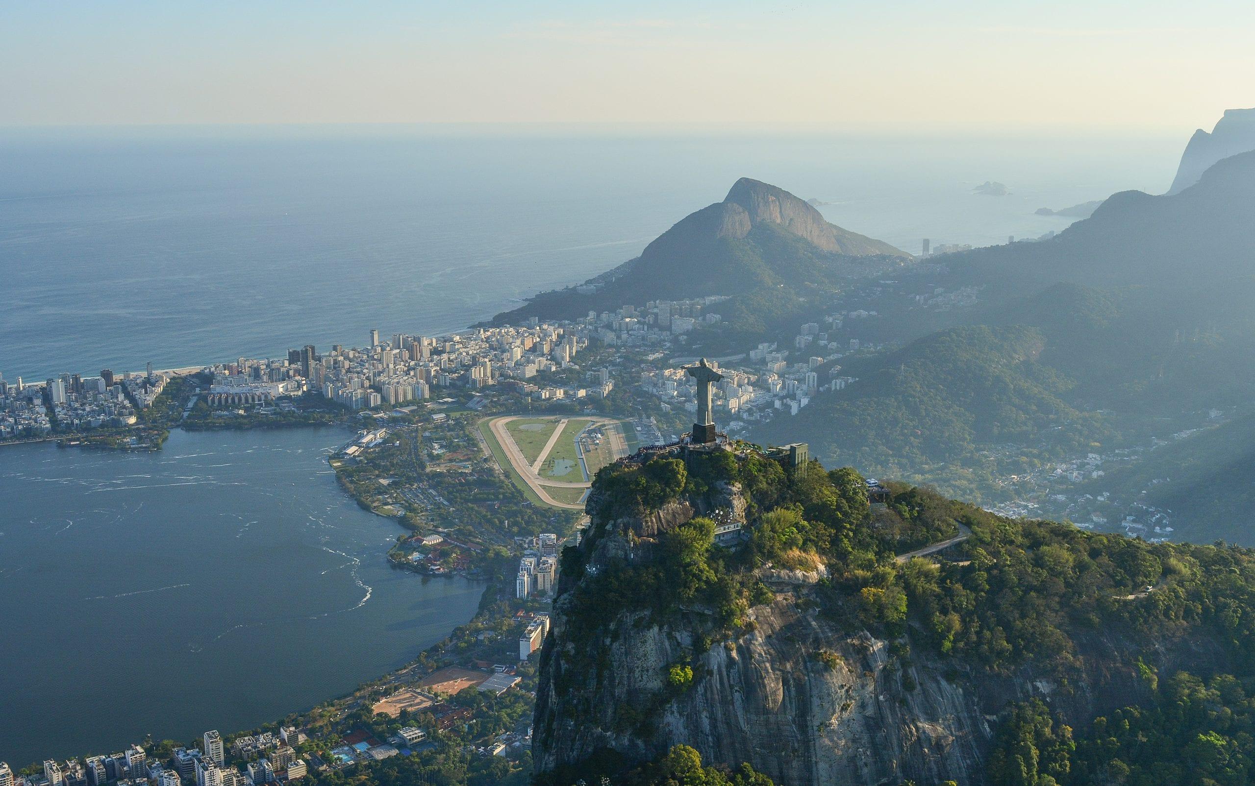 A view of a body of water with a mountain in the background