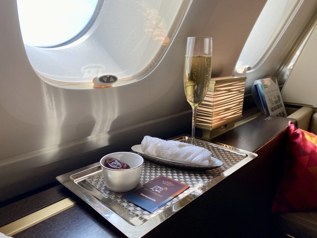 etihad first class pre departure champagne