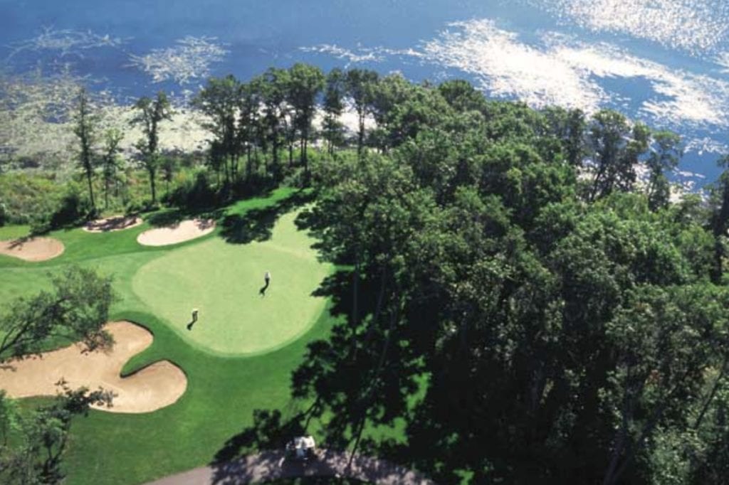 A view of a lush green golf course