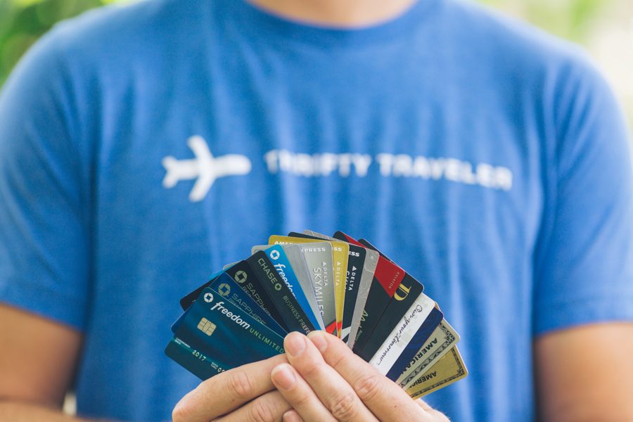 a person holding credit cards
