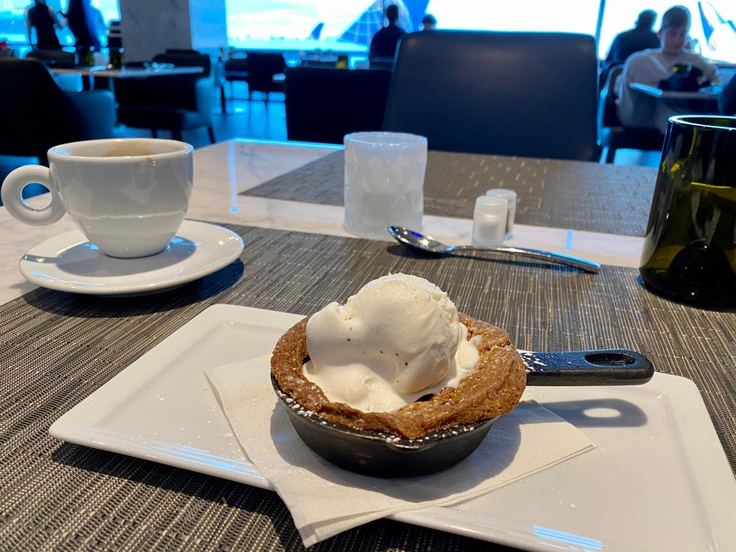 skillet of chocolate chip cookie with ice cream