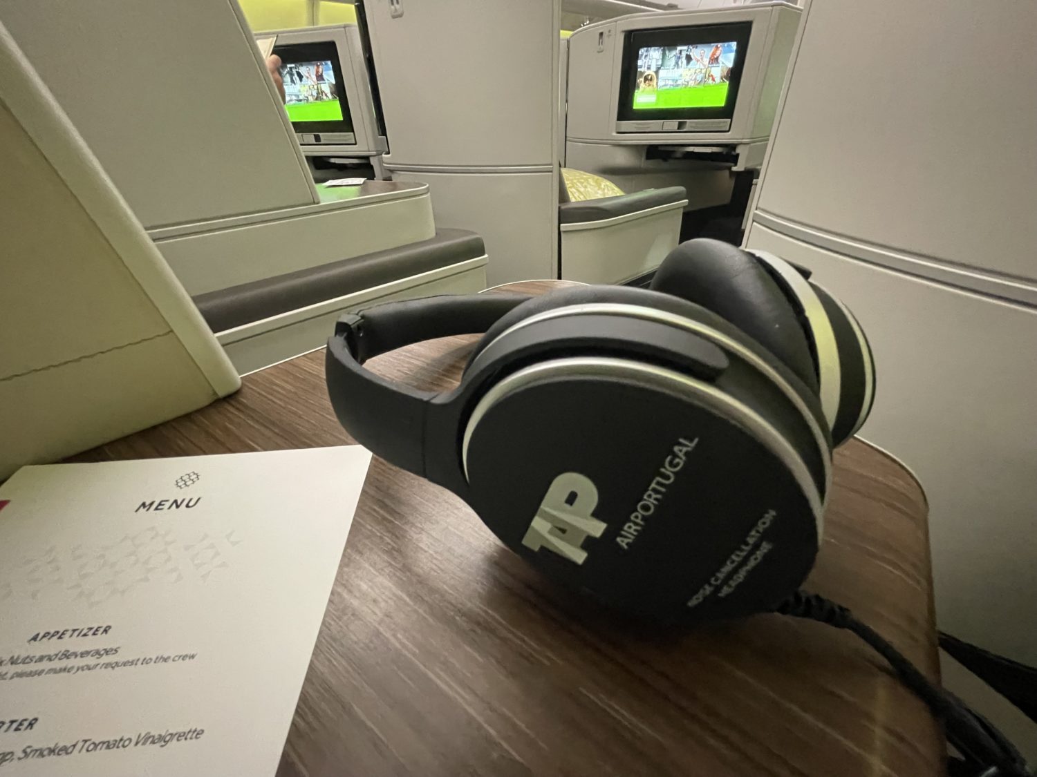 TAP business class headphones and table