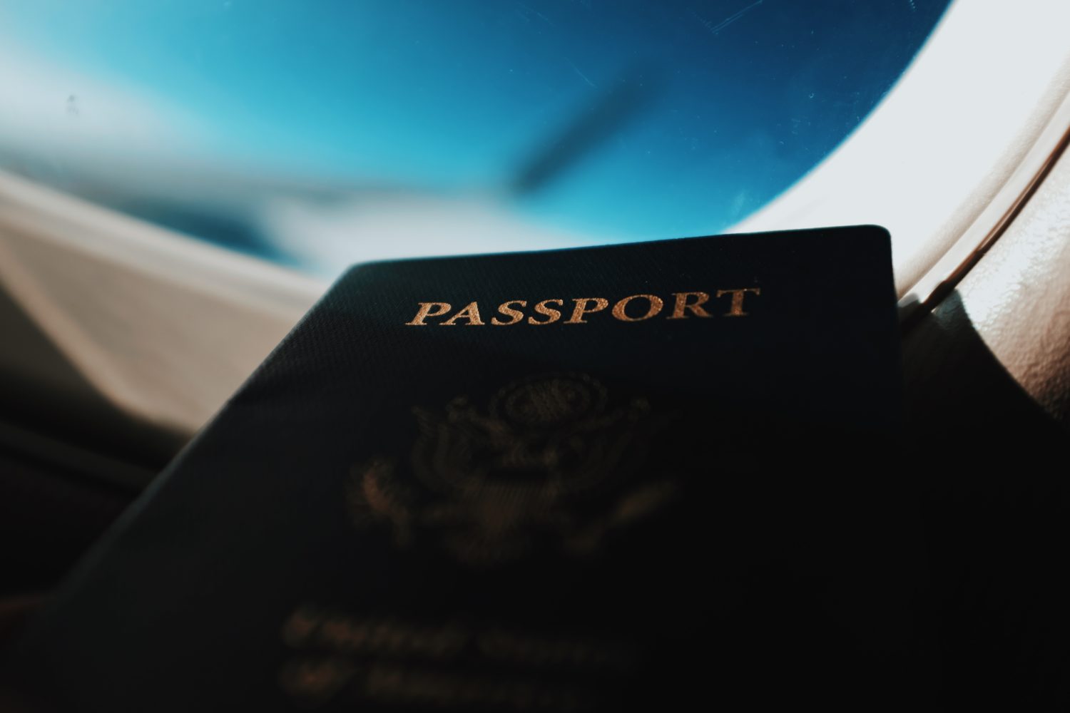 passport in plane window