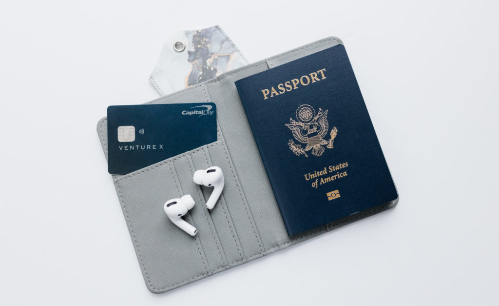 capital one venture x card in a passport case