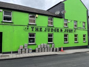 green painted pub in ireland