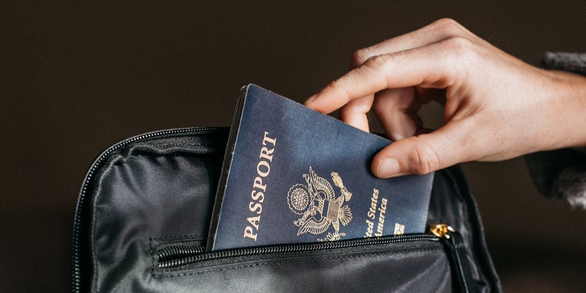 putting a passport in a bag