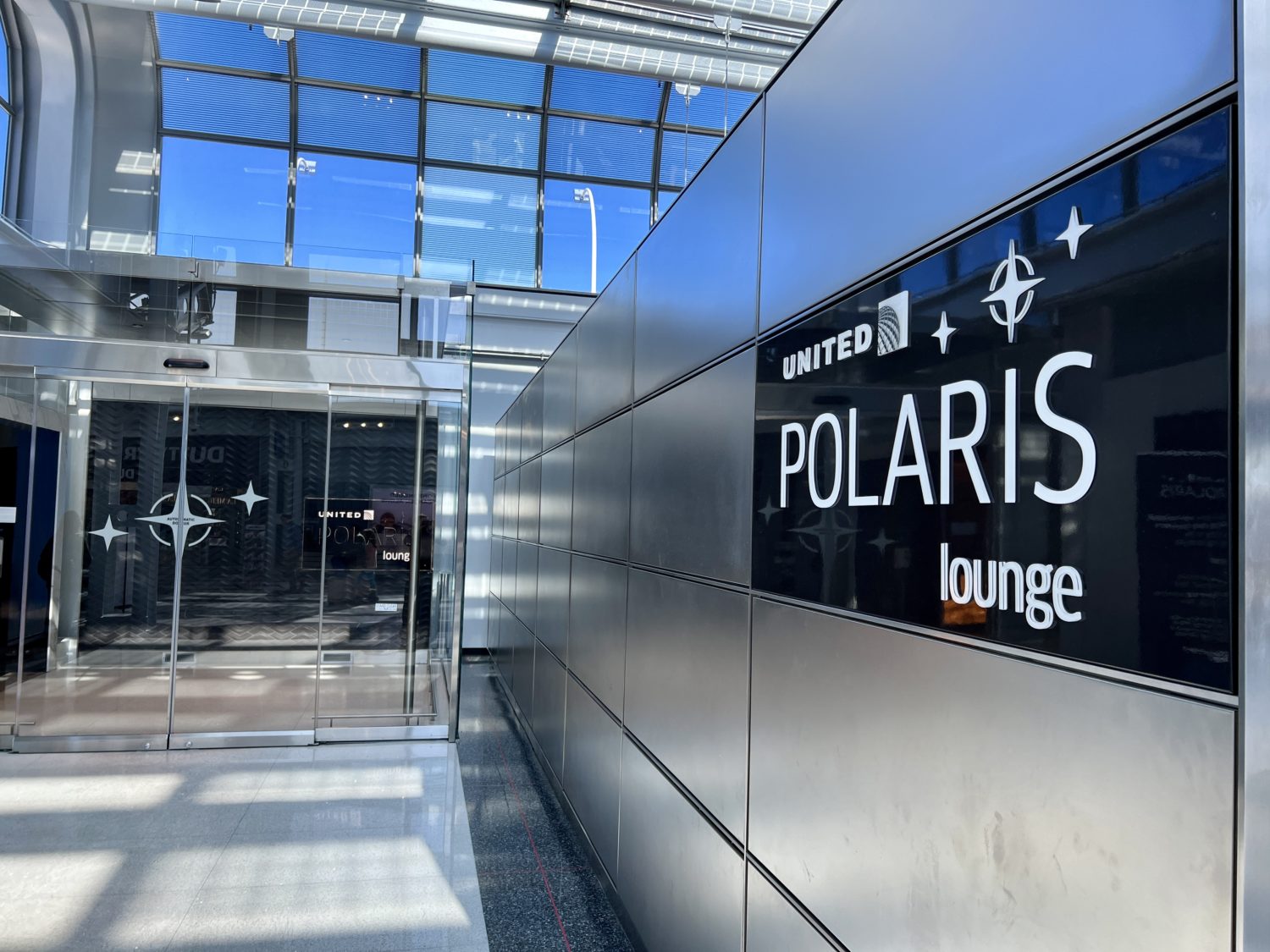united polaris lounge chicago entrance  Review: United Polaris Lounge Chicago (ORD) &#8211; Thrifty Traveler united polaris lounge chicago entrance scaled