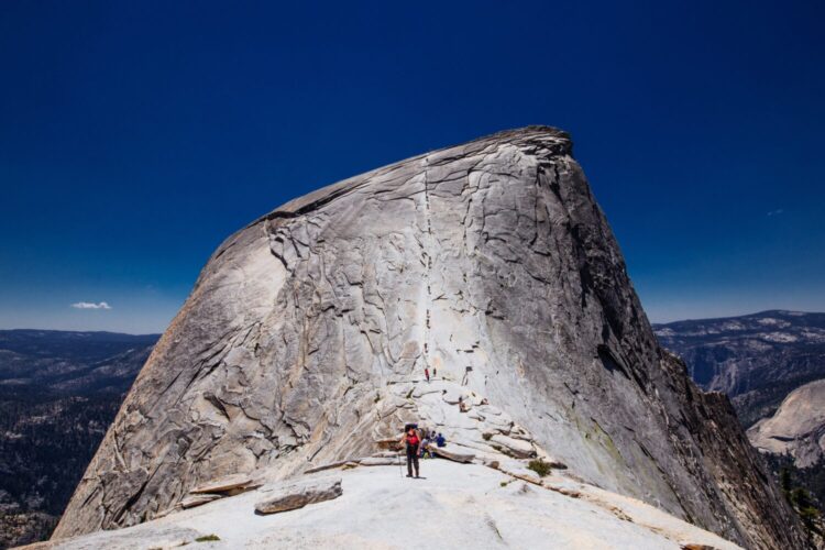 Hikers on the Half Dome in Yosemite National Park