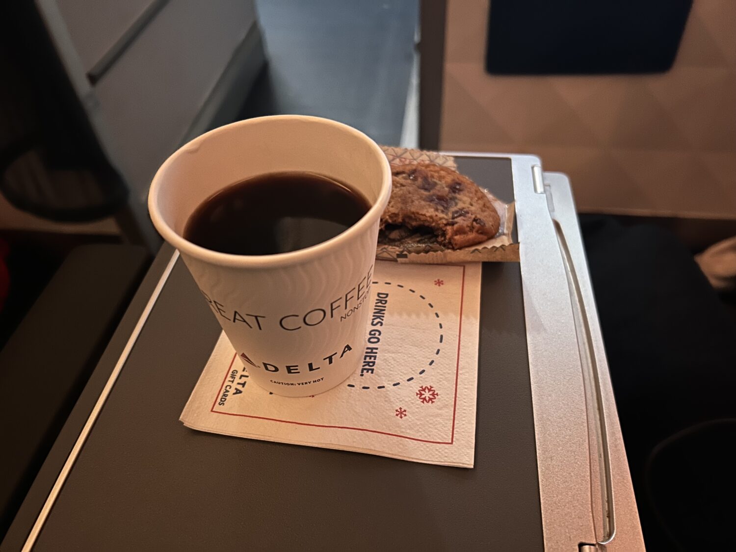 Delta Premium Select coffee and cookie