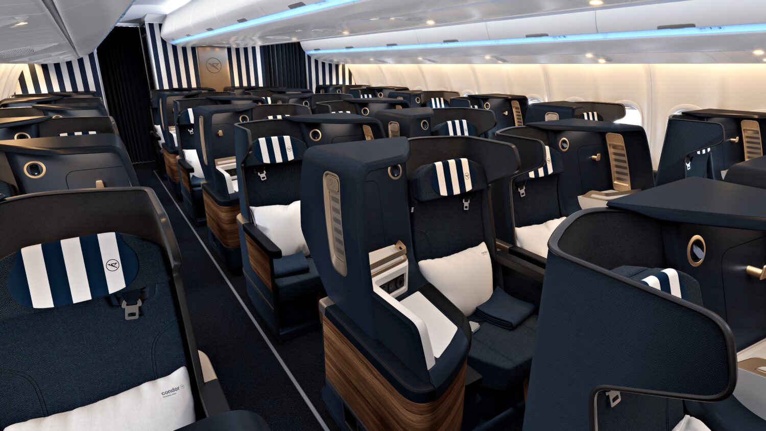 Interior of airplane with blue and white seats.
