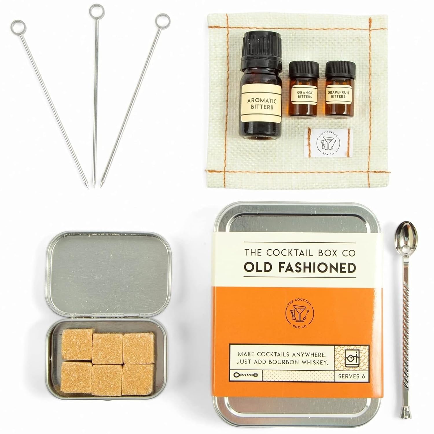 The Best Last-Minute Stocking Stuffers & Christmas Gifts for Travelers 13 old fashioned cocktail kit in metal tin with accessories, sugar, and bitters