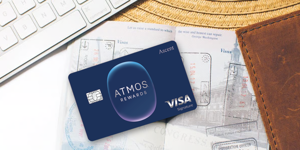 Atmos Ascent card on top of an open passport