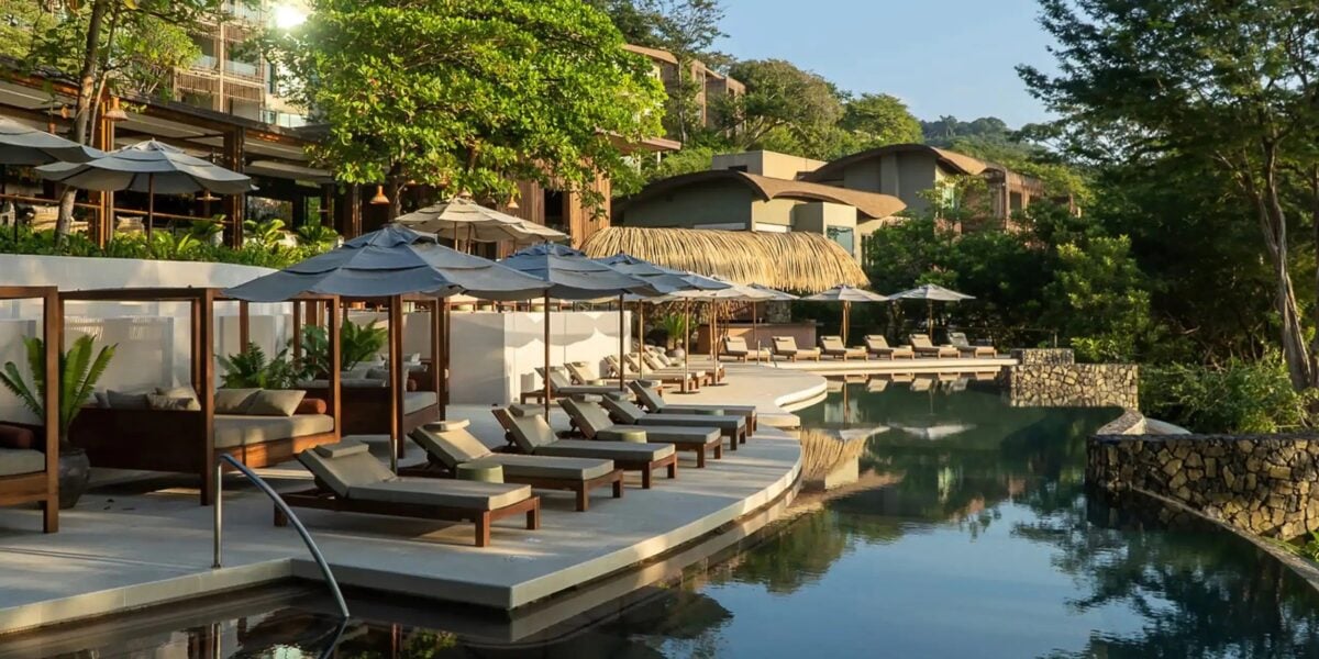 andaz costa rica pool with lounge chairs