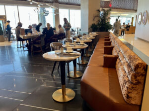 bench seating Delta One lounge LAX