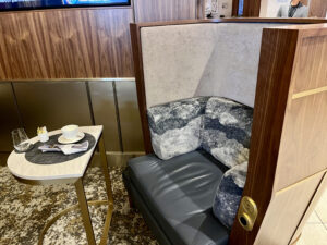 solo booth seats in the Delta One lounge LAX