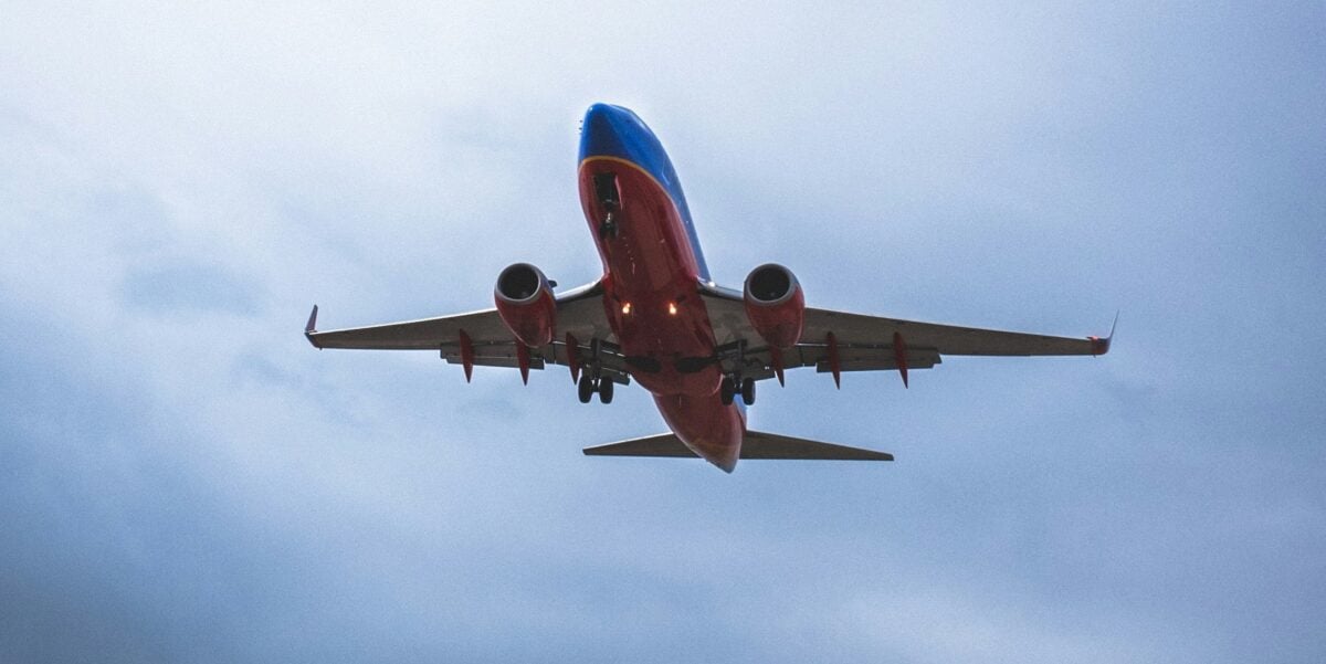 southwest plane flying through a dark sky