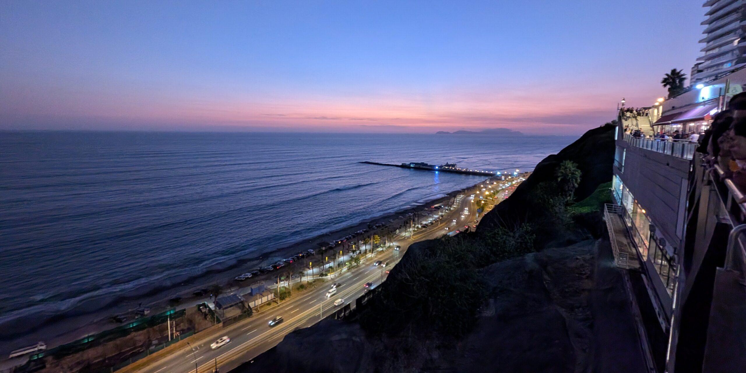 A candy colored sky meets the ocean at Larcomar in Lima, Peru.