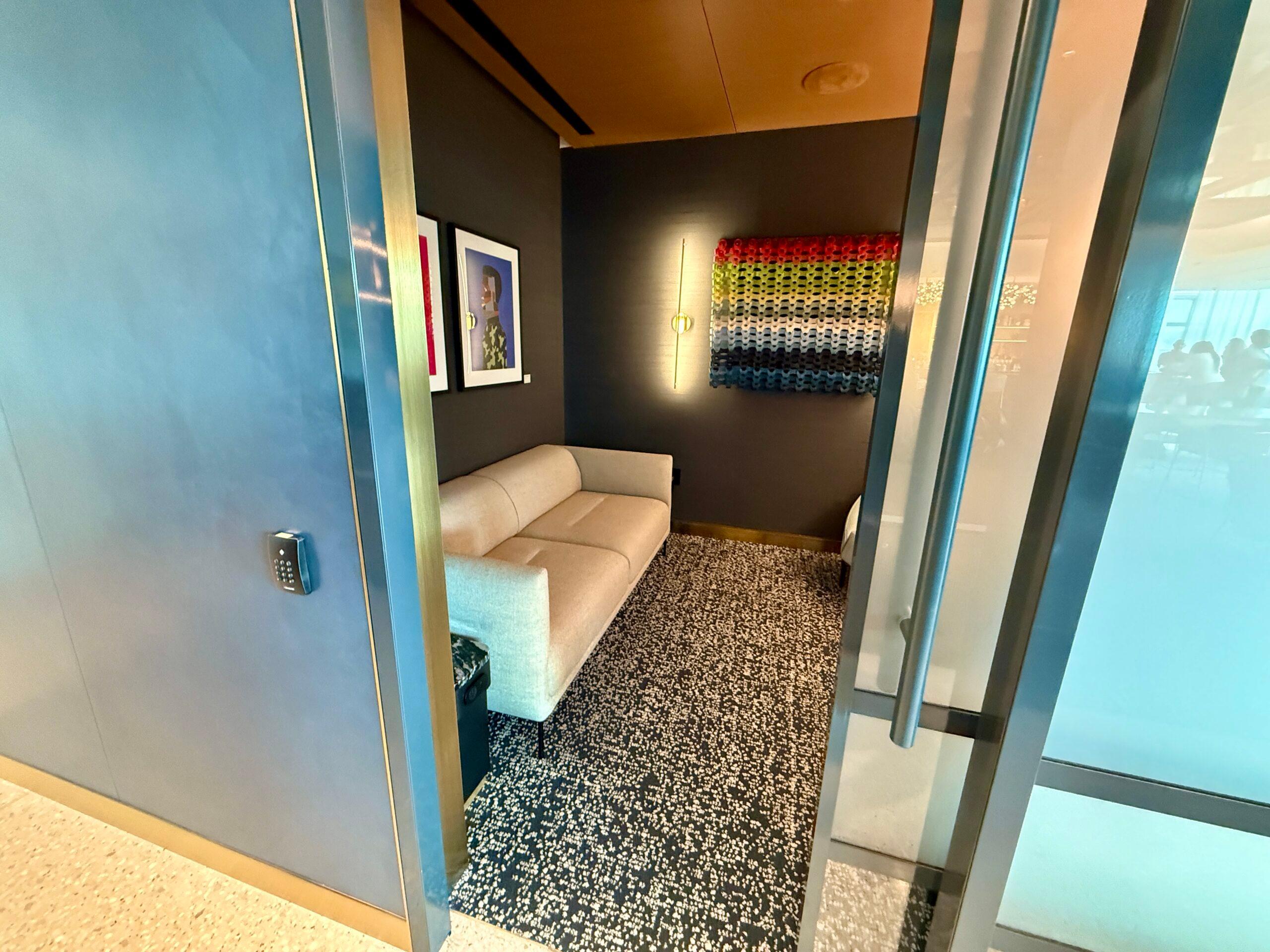 long gray couch in a small room