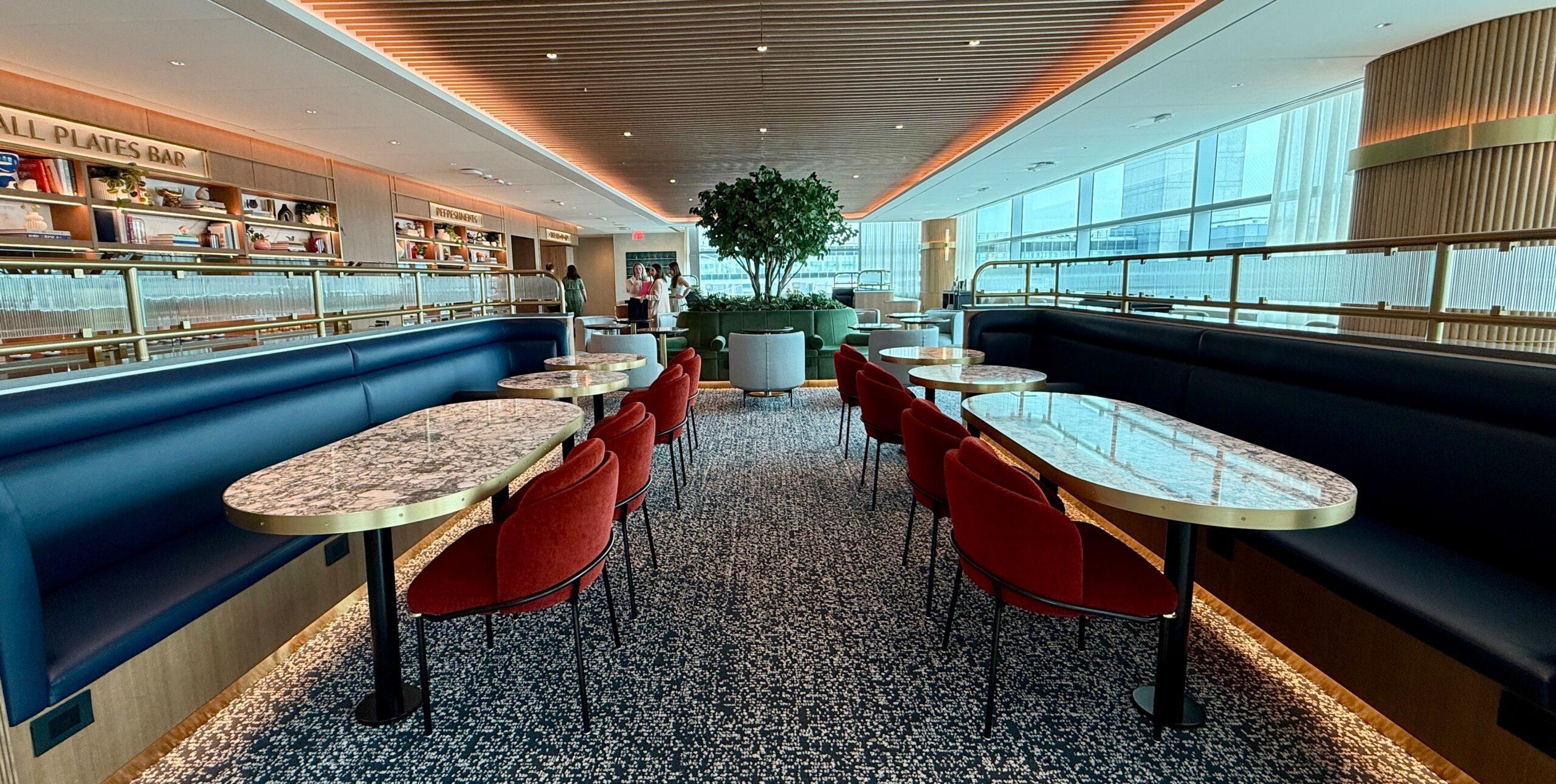 capital one lounge jfk with chairs and benches