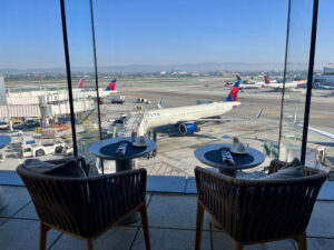outdoor patio window seats at Delta One Lounge LAX