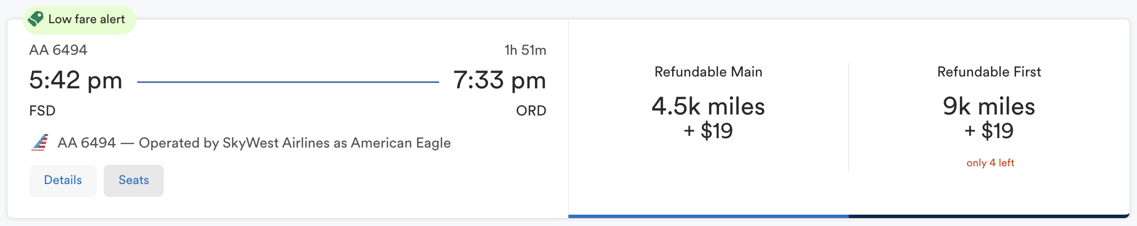 Alaska Airlines award flying AA from FSD-ORD for 4,500 miles one way in economy or 9,000 in first class. 