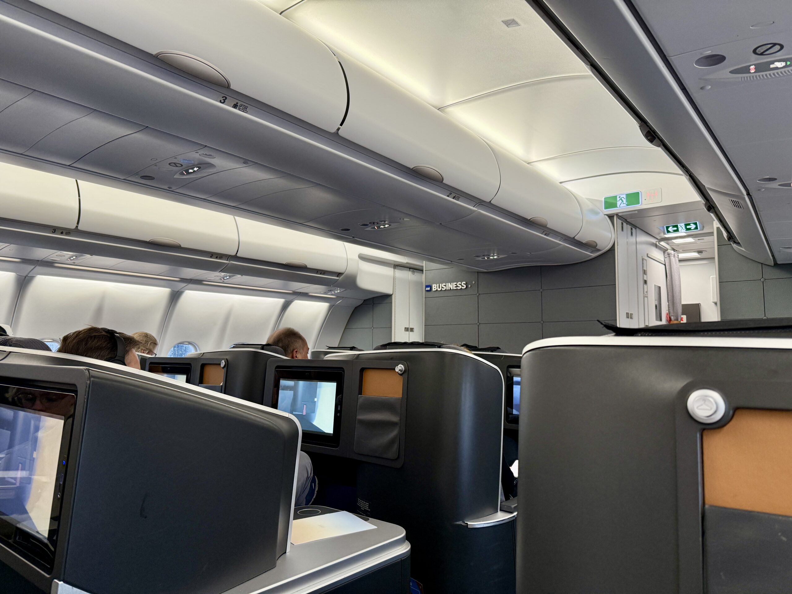 sas business class cabin with passengers in their seats