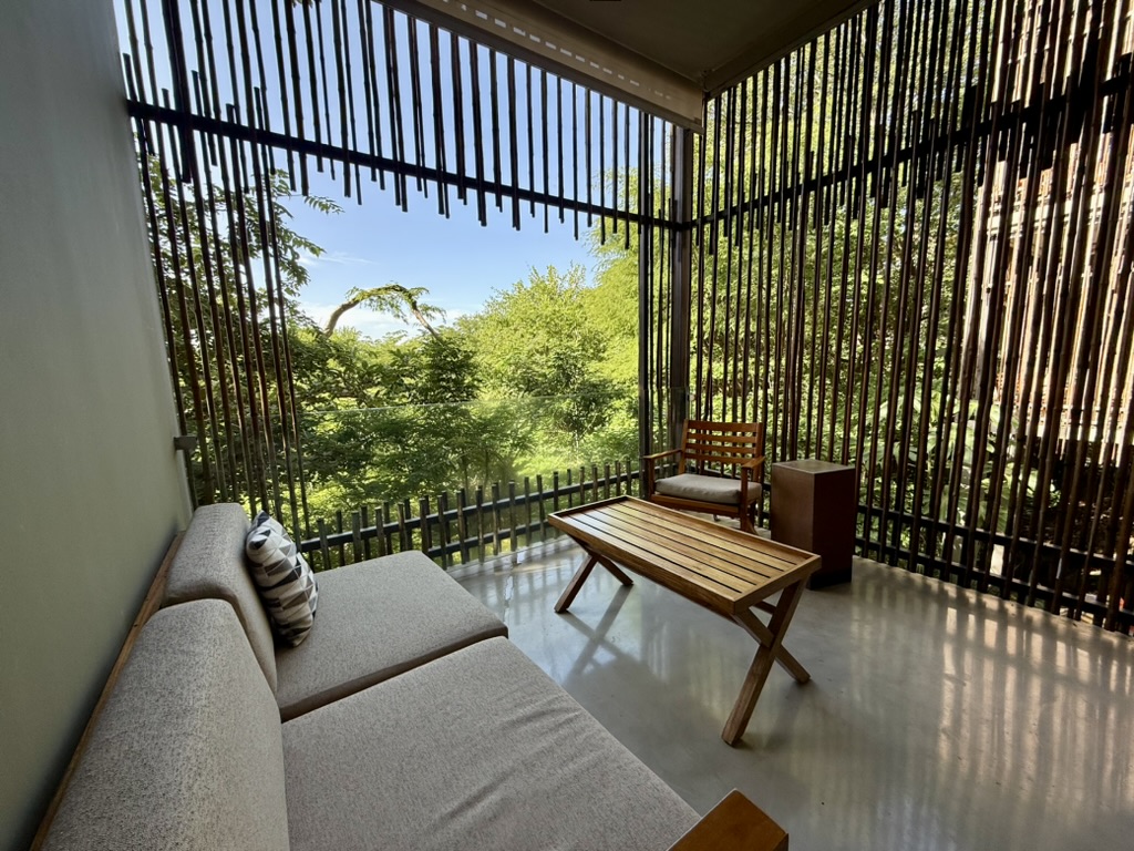 Balcony with sofa, chair, and coffee table at the Andaz Peninsula Papagayo
