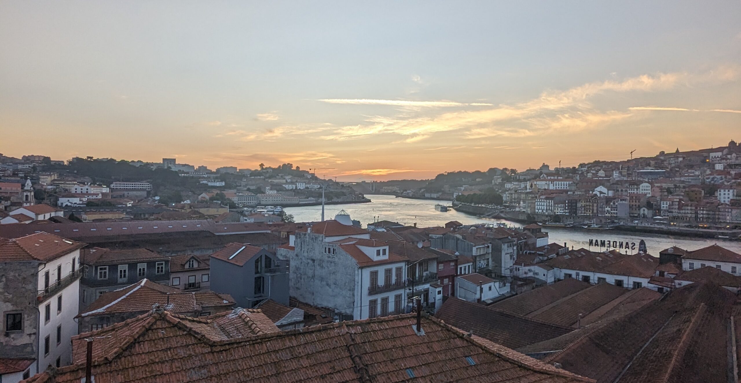 The sunsetting in Porto over the Douro River
