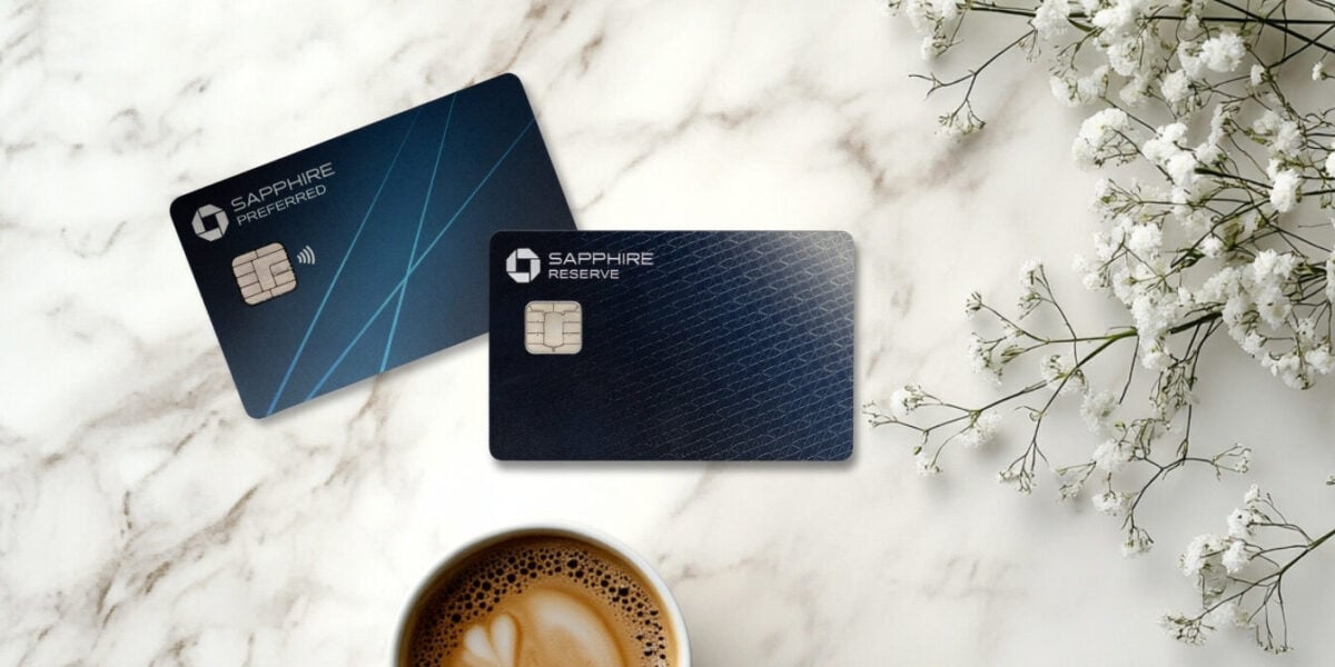 Sapphire cards with flowers and a cup of coffee on a table top.