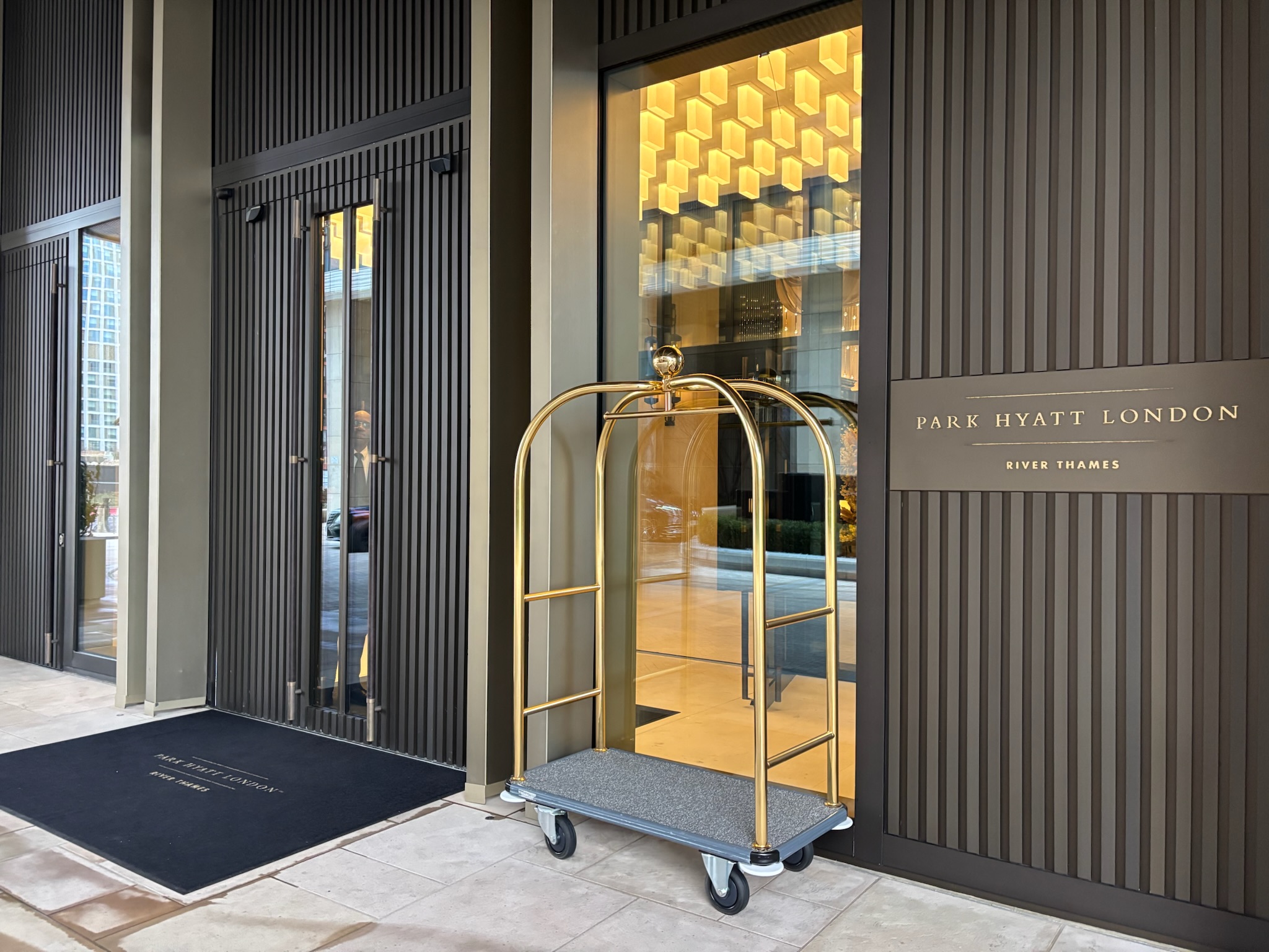 Inside the Park Hyatt London River Thames: Rooms, Dining, Pool & More 5 Park Hyatt London River Thames entrance with door and luggage cart