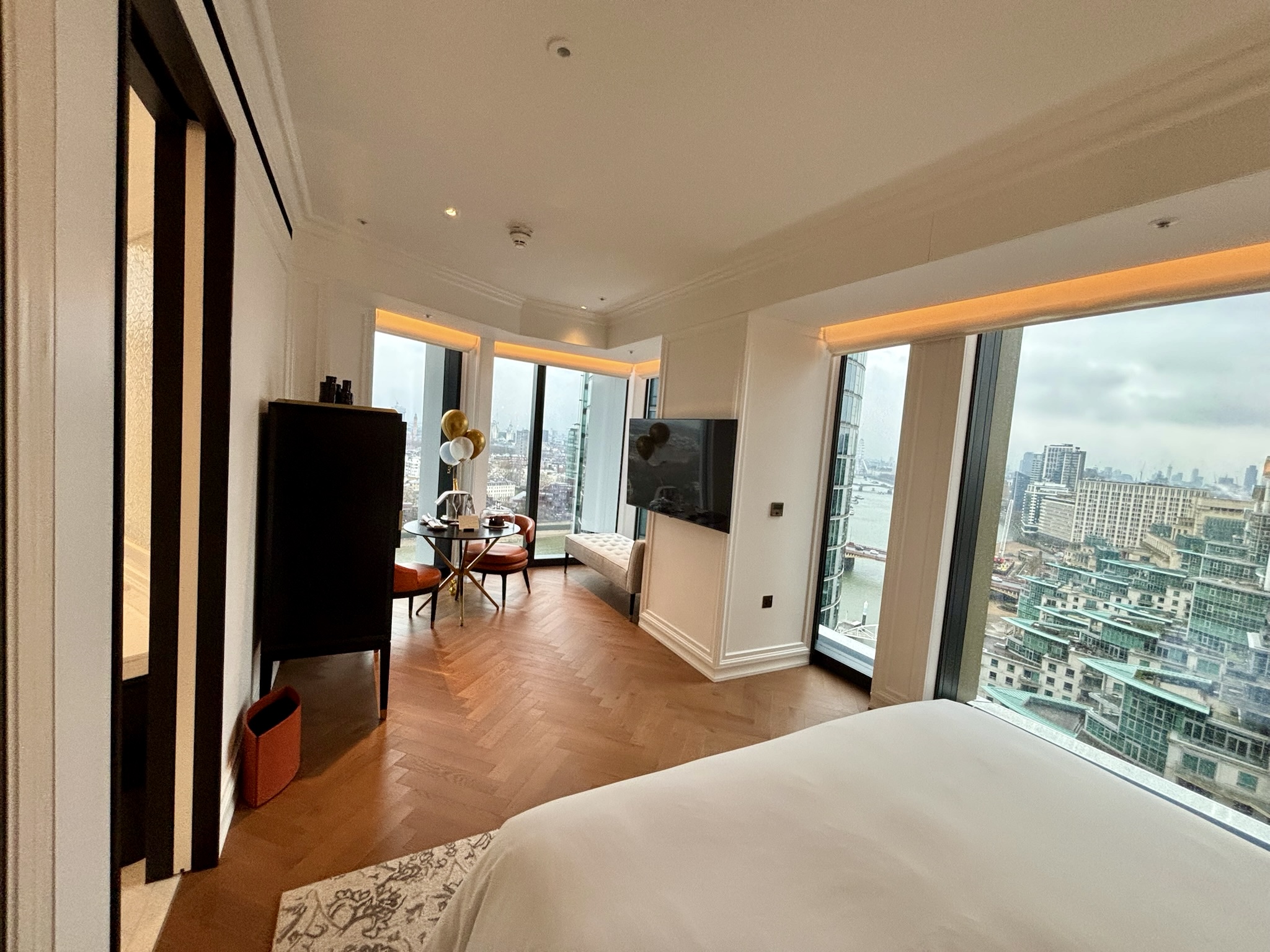 Inside the Park Hyatt London River Thames: Rooms, Dining, Pool & More 24 A corner king room at the Park Hyatt London River Thames with king sized bed and seating area + wall-mounted TV