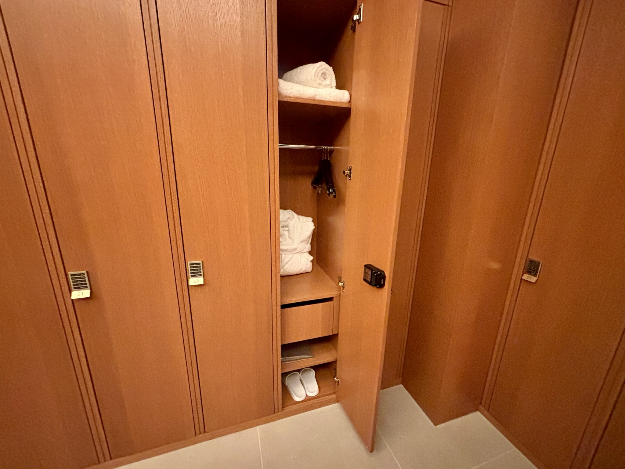 Inside the Park Hyatt London River Thames: Rooms, Dining, Pool & More 47 open locker with towels, slippers, and robe