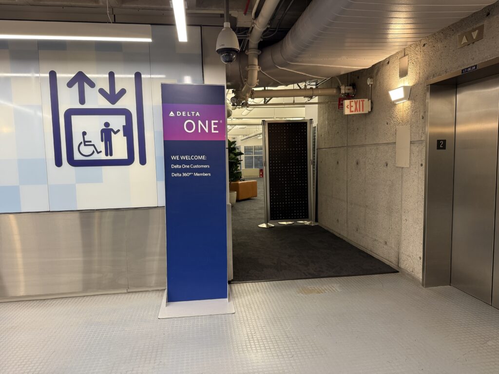 Sign for Delta One check-in area at MSP airport