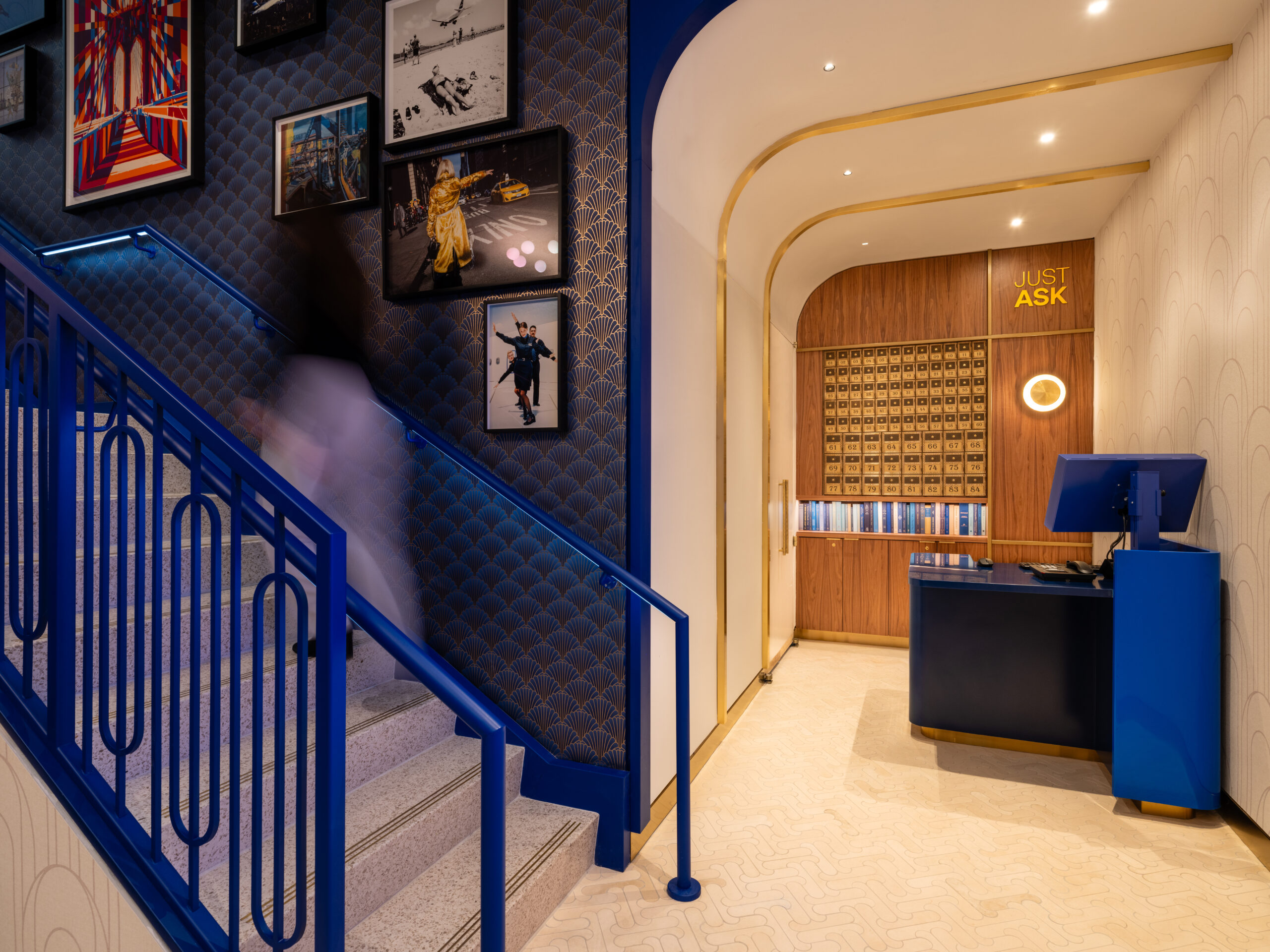 JetBlue's First 'BlueHouse' Lounge Opens at JFK Next Week! 2 jetblue lounge with entry desk and blue staircase
