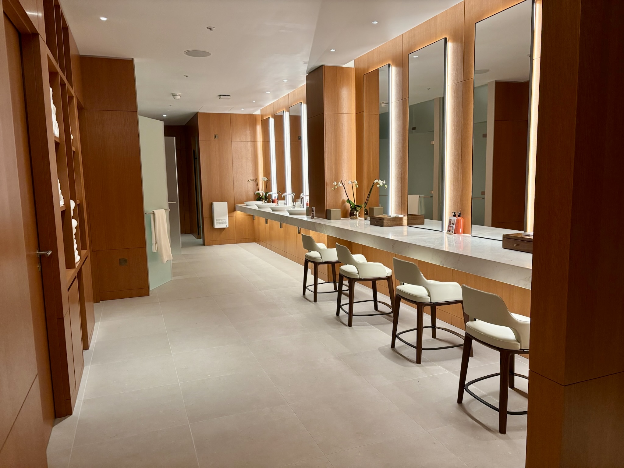 Inside the Park Hyatt London River Thames: Rooms, Dining, Pool & More 48 locker room vanity and sitting area with mirrors