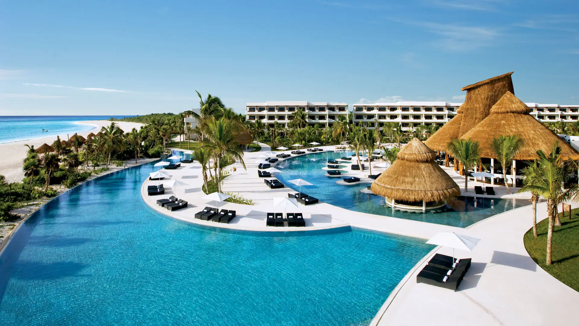 8 of the Best All-Inclusive Resorts in Cancún (Bookable With Points) 4 Aerial view Secrets Maroma Beach resort and pool with beach in the background