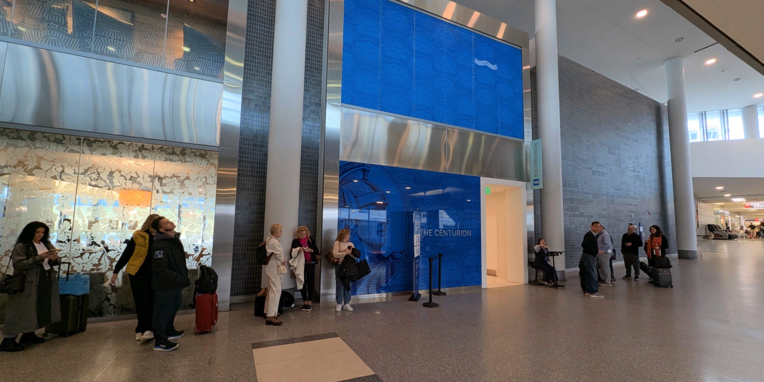 From Dallas to Boston, Amex Plans New & Expanded Centurion Lounges 1 Amex Centurion Lounge (PHL) line to get in