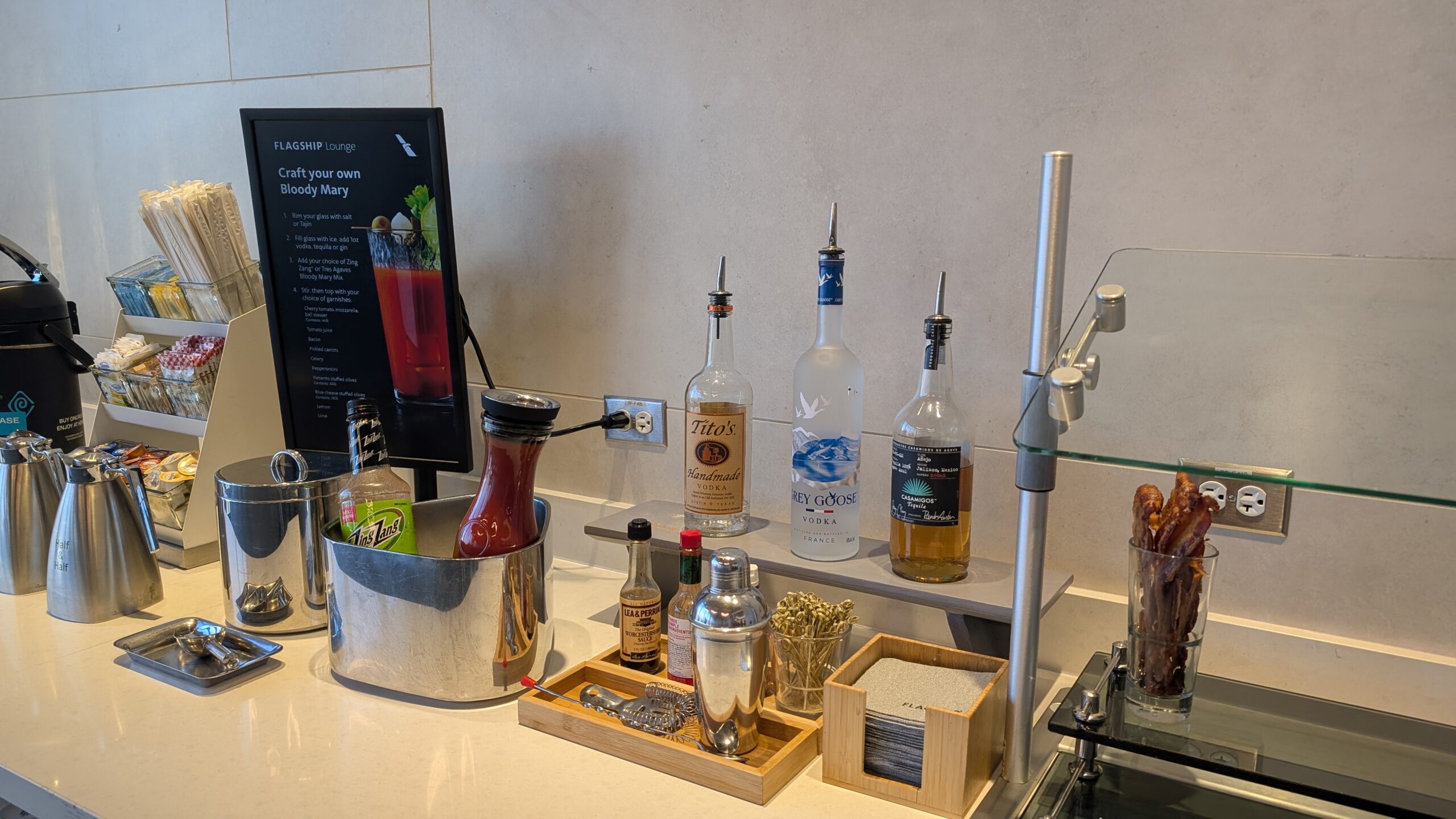 American Airlines' New Flagship Suite Review: A Stellar Hop Across the Pond 11 AA Flagship Lounge (ORD) bloody mary bar