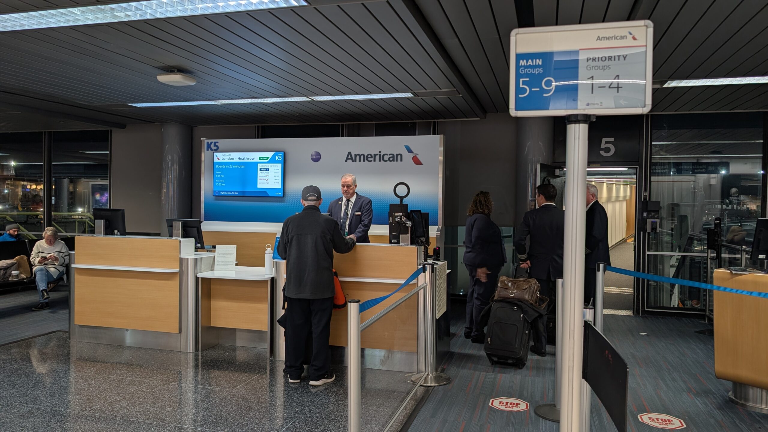American Airlines' New Flagship Suite Review: A Stellar Hop Across the Pond 12 AA boarding gate for flight to London